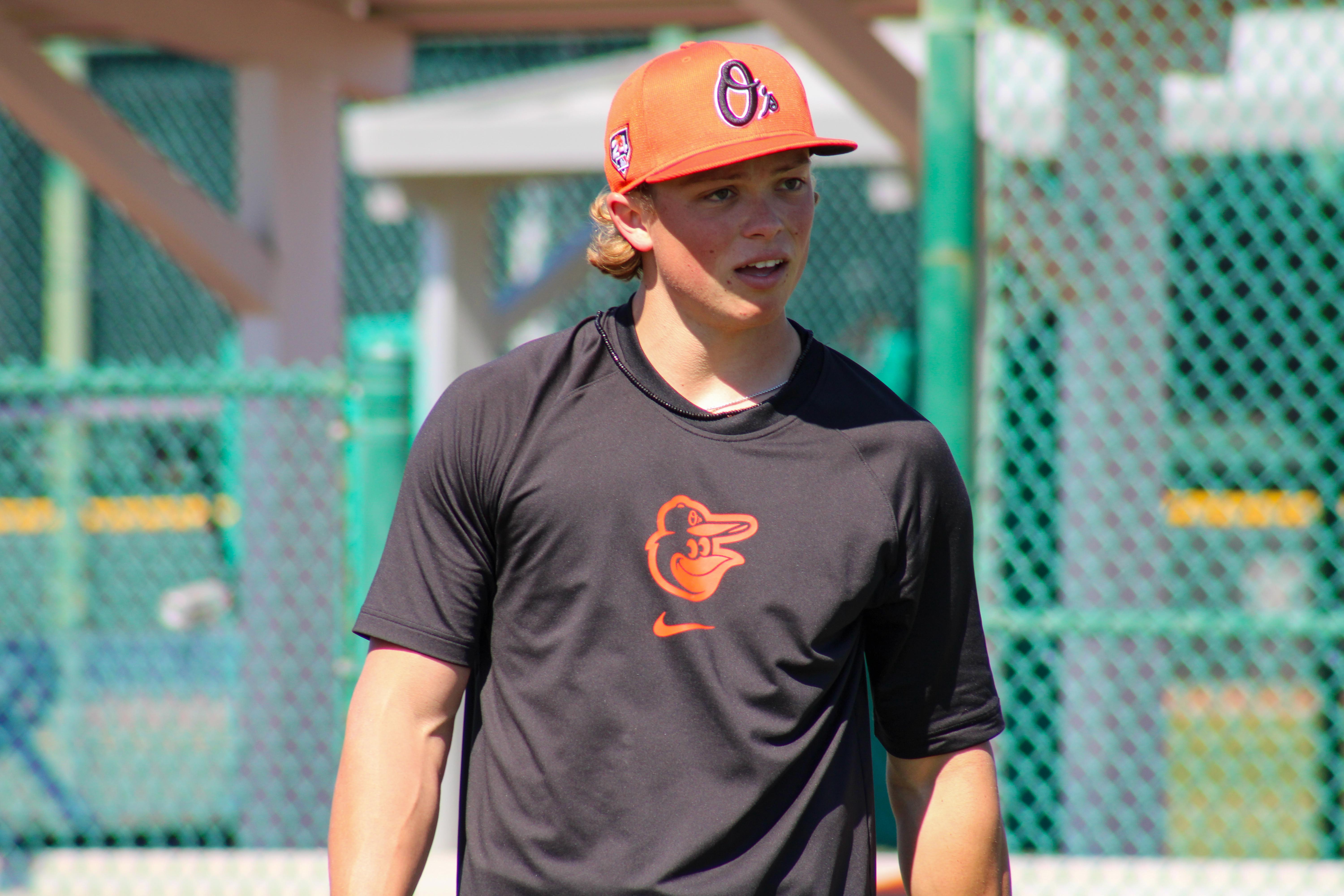 Holliday hustles and homers, Cowser and Norby add to prospect showcase in 13-8 win