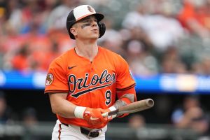 O’Neill marks return to Orioles with two-run single before storm ends game early