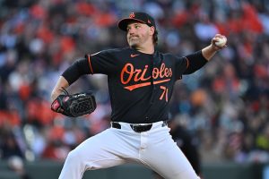 Orioles DFA Enns to make room for Raquet